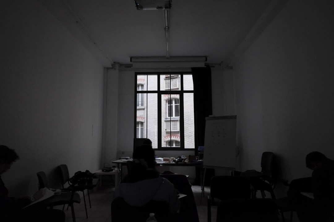 Training room with people sitting in a discussion circle
