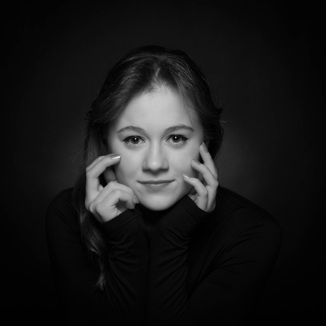 Studio portrait of a Slovenian woman in her forties, professional attire